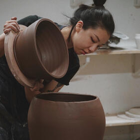 potters in pottery studio